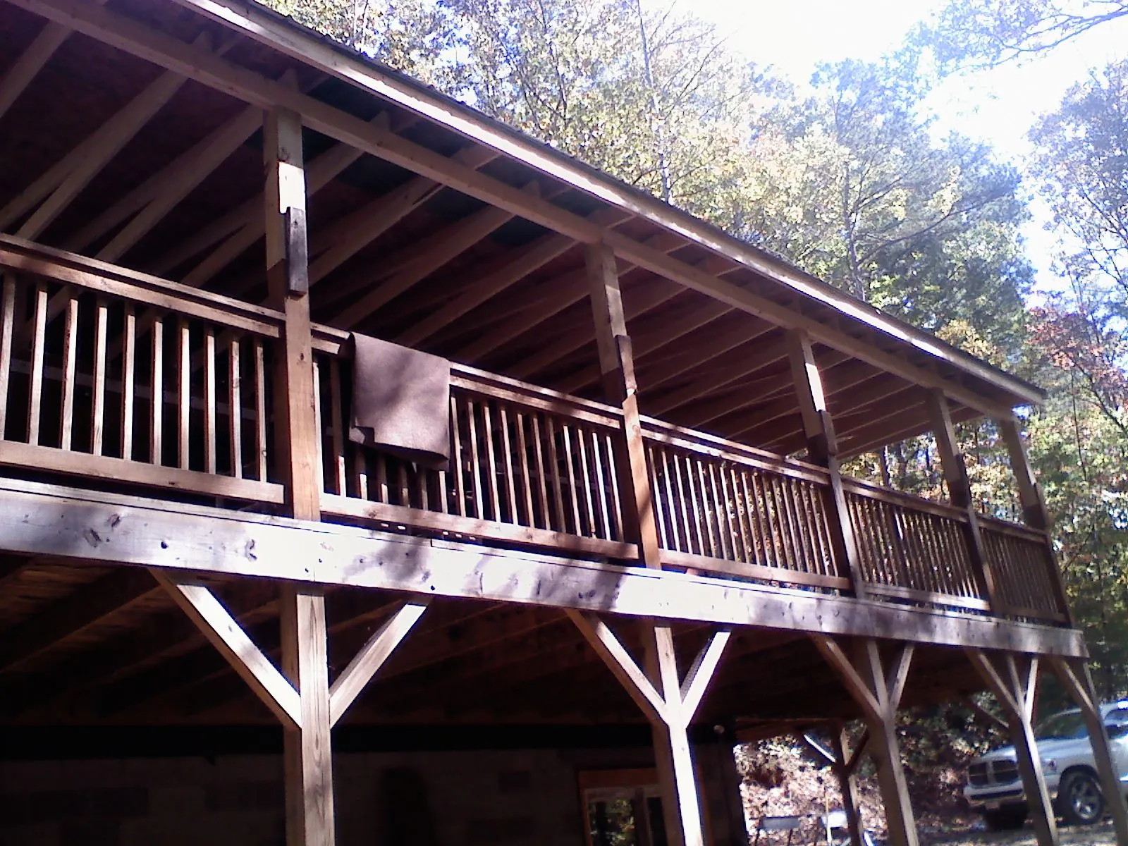 Timber framing under a new elevated porch and deck — Roof Leak Repair in Davidsville by Roofing Brothers